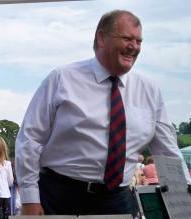 PeterJones Peter Jones in white shirt and red tie