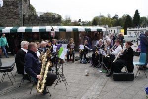 Very early concert at the Artists Market Tavistock, 5 May 2012. Band members are seated